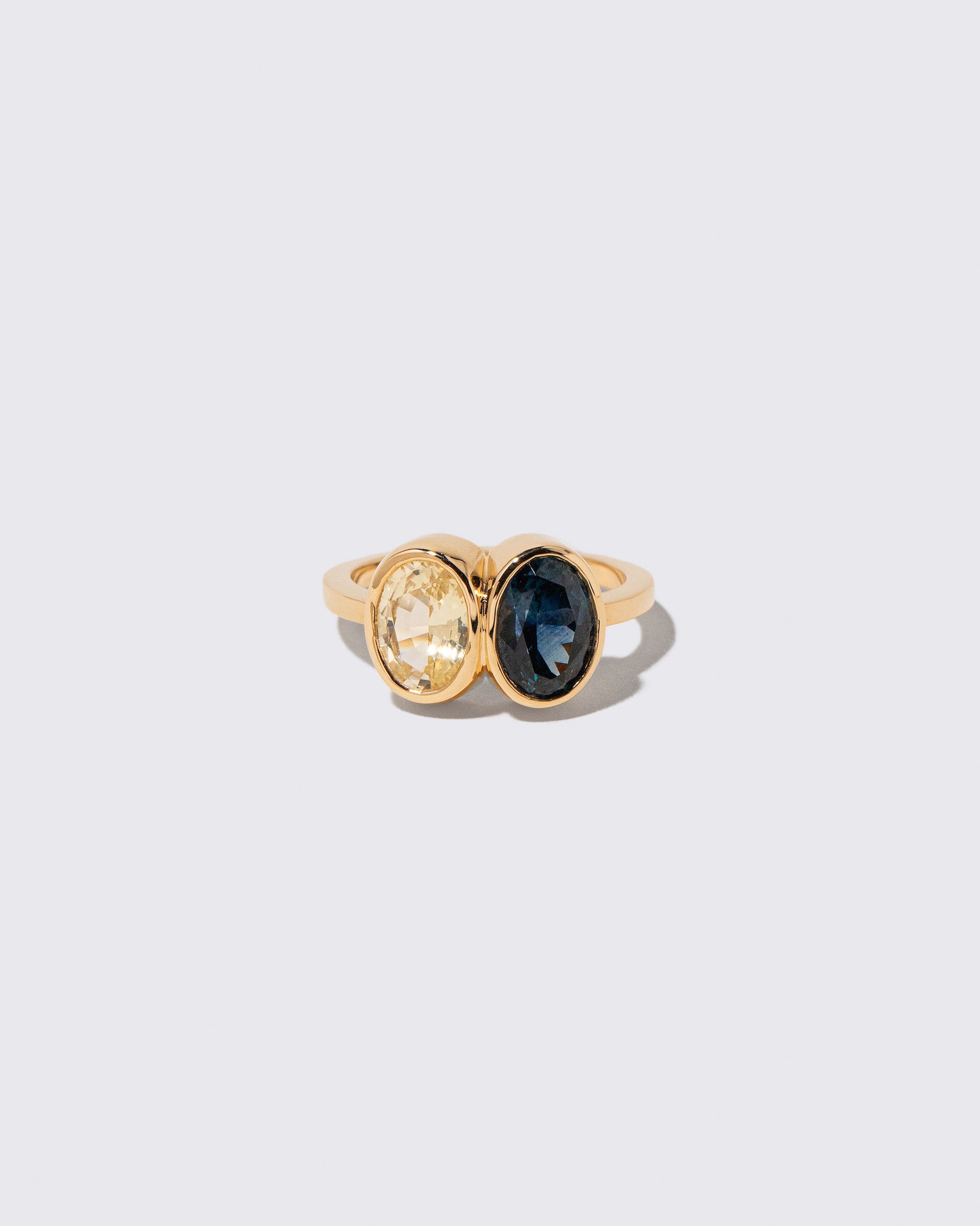 Double Drop Ring on light color background.
