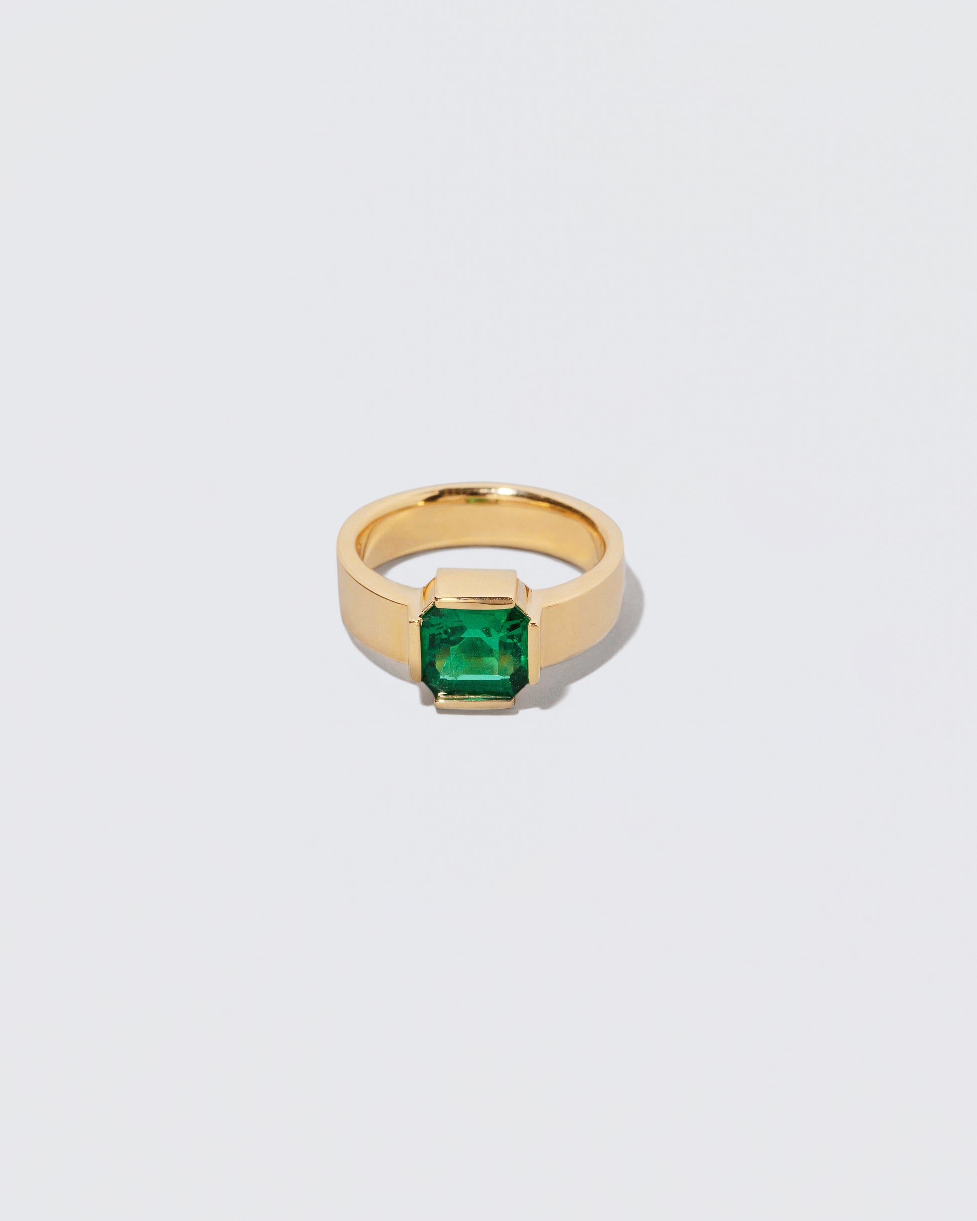 Enfold Ring on light color background.