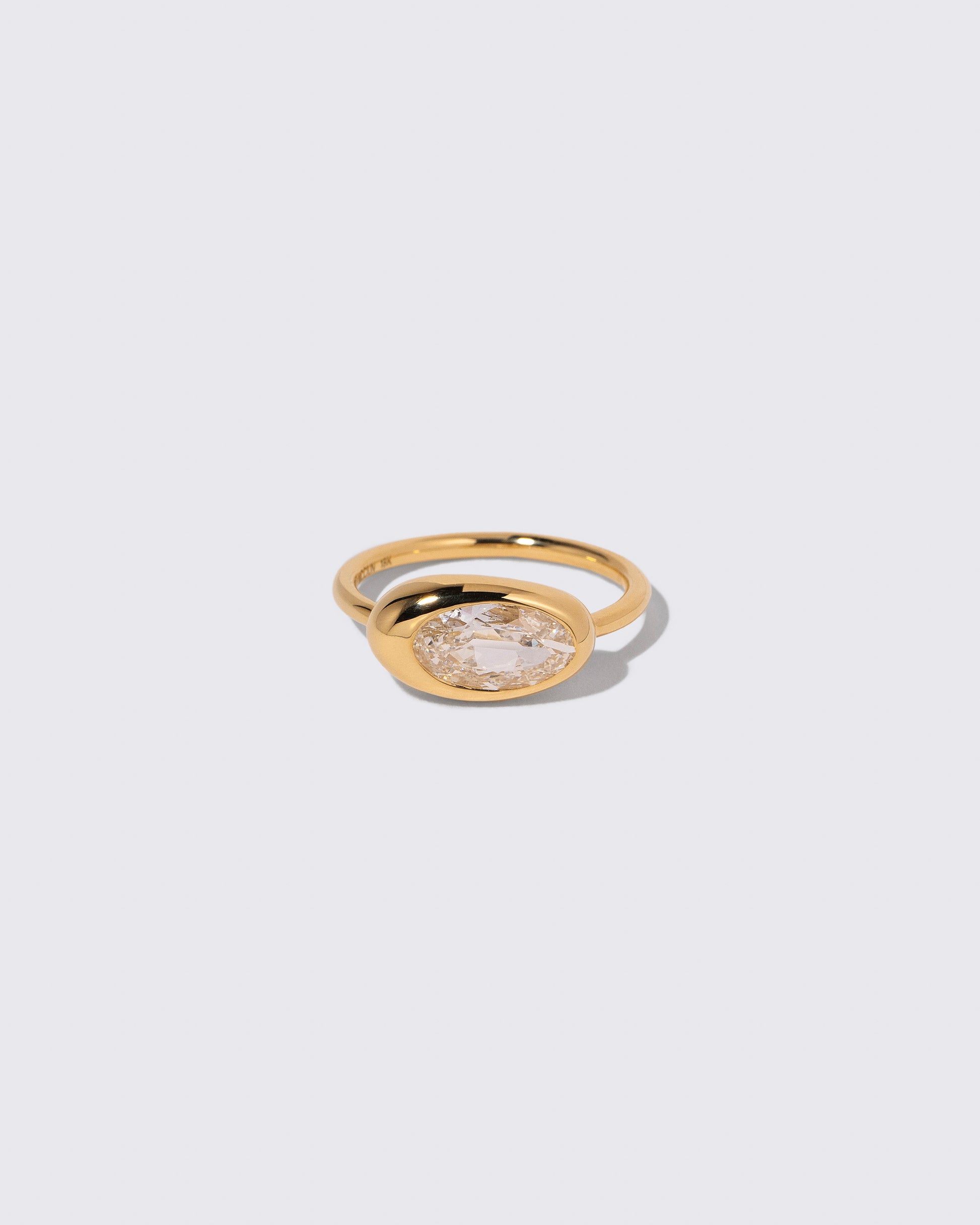 Moval Diamond Equalize Ring on light color background.
