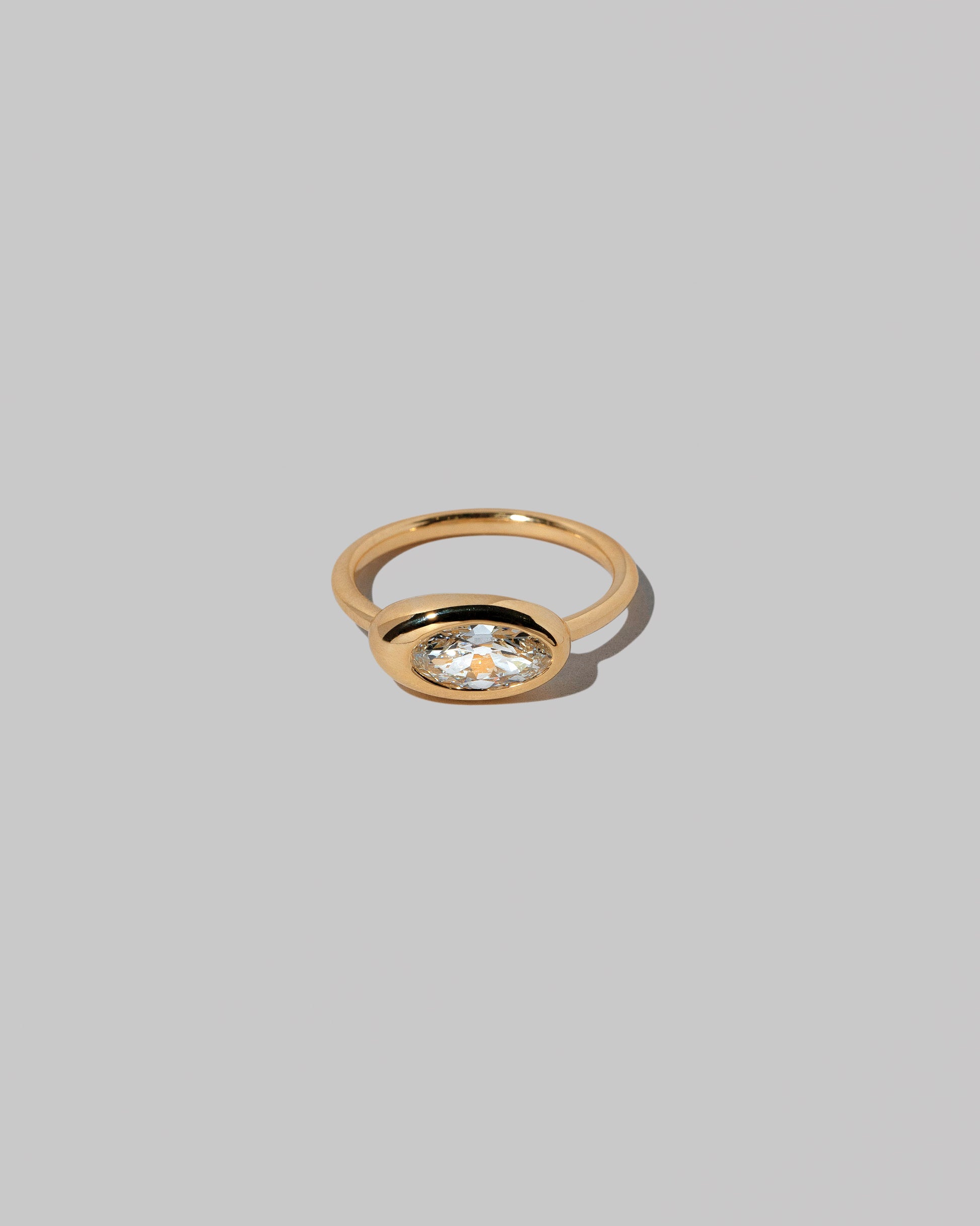 Moval White Diamond Equalize Ring on light color background.