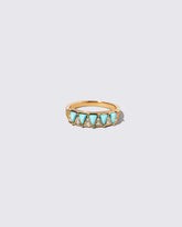 Gold Turquoise Five Triangle Ring on light color background.