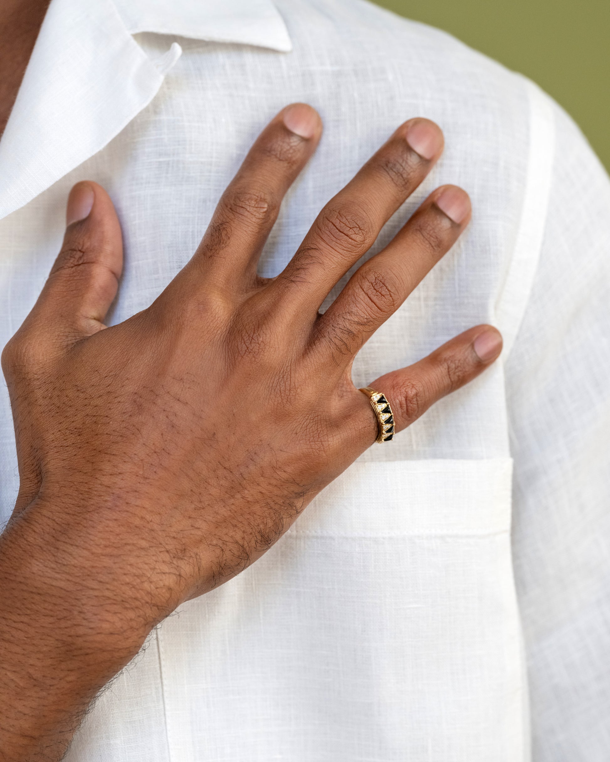 Gold Black Spinel Five Triangle Ring on male model.