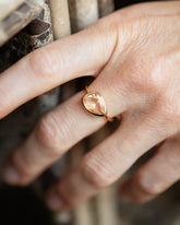 Peach Pink Sapphire Gusher Ring on model.