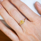 product_details::Yellow Sapphire Gusher Ring on model.