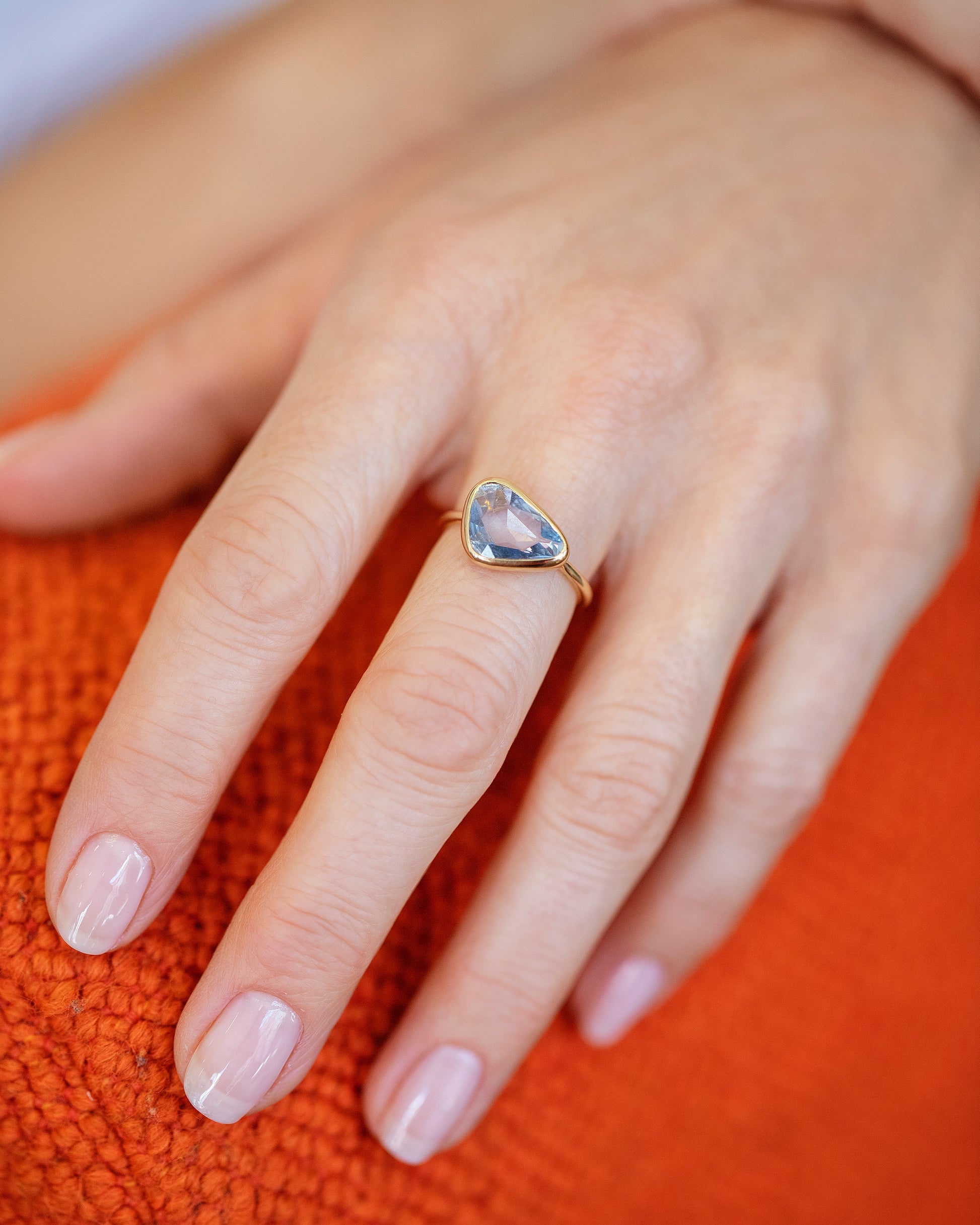 Gusher Blue Sapphire Ring 056 on model.