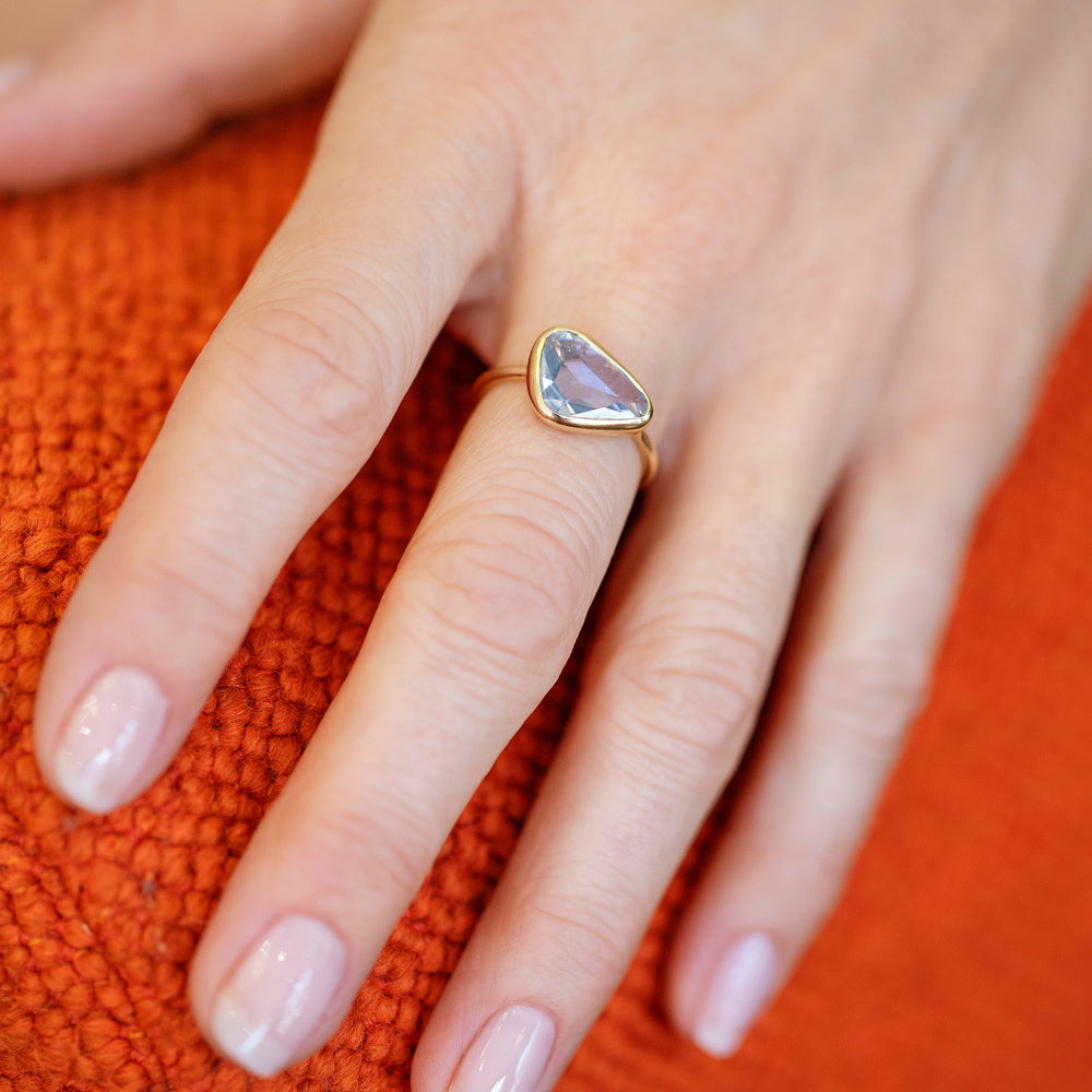 product_details::Gusher Blue Sapphire Ring 056 on model.