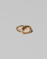 View from the side of the Gusher Diamond Ring 013 on light color background.