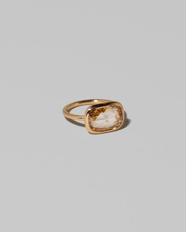 View from the side of the Gusher Diamond Ring 013 on light color background.