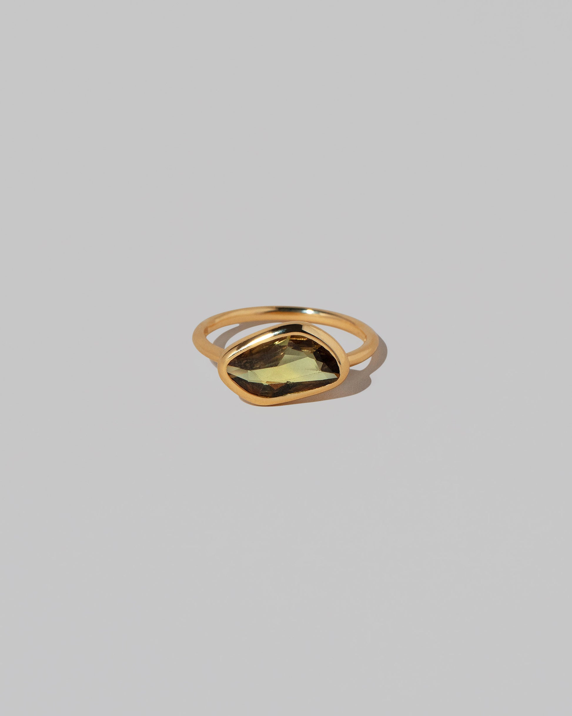 Gusher Green/Yellow Sapphire Ring 034 on light color background.