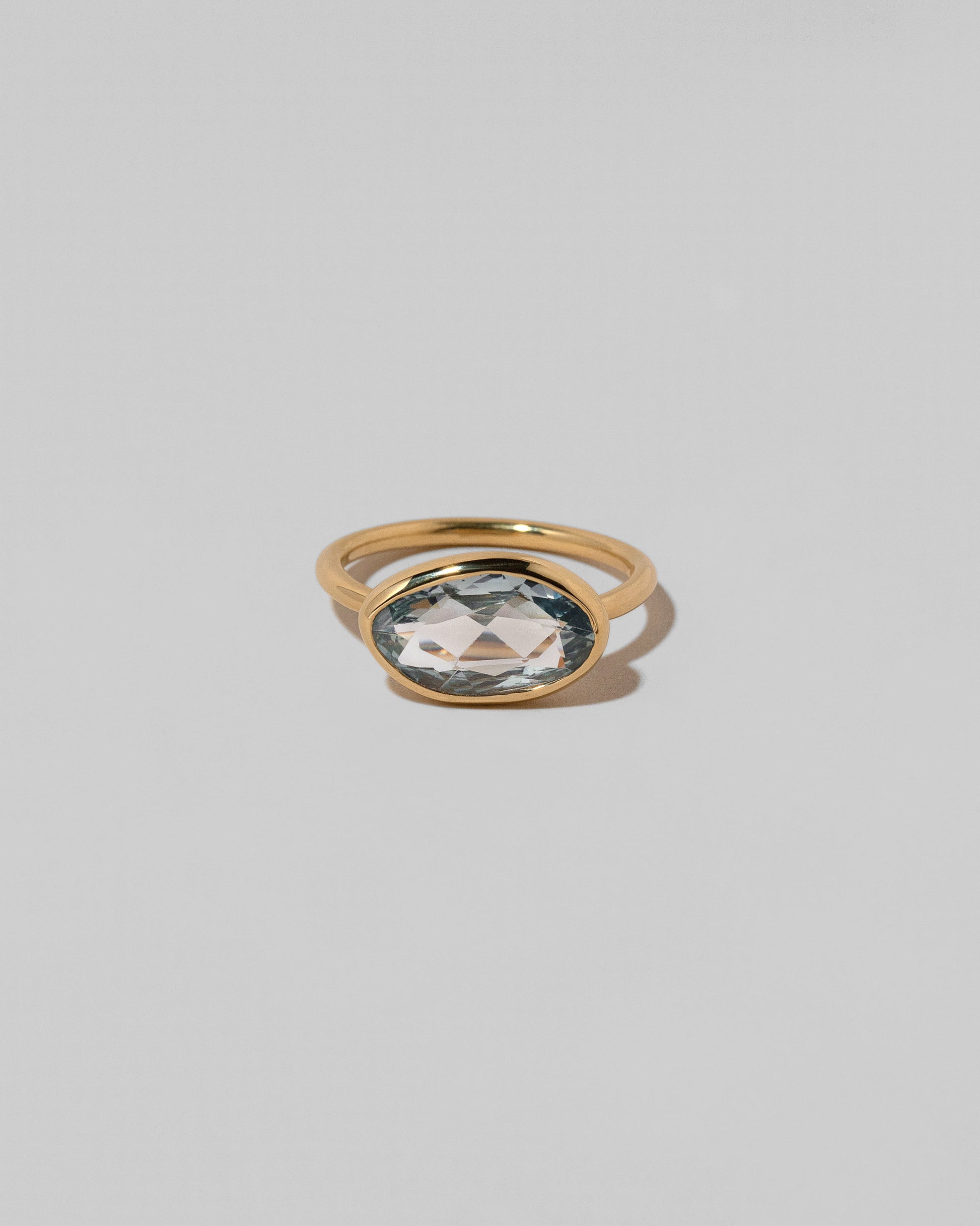 Gusher Blue Sapphire Ring 039 on light color background.