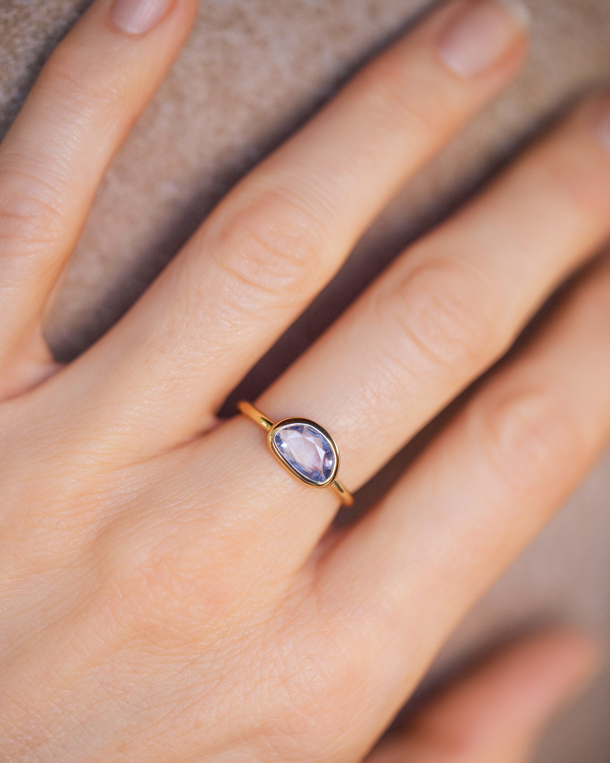 Gusher Blue Sapphire Ring 055 on model.