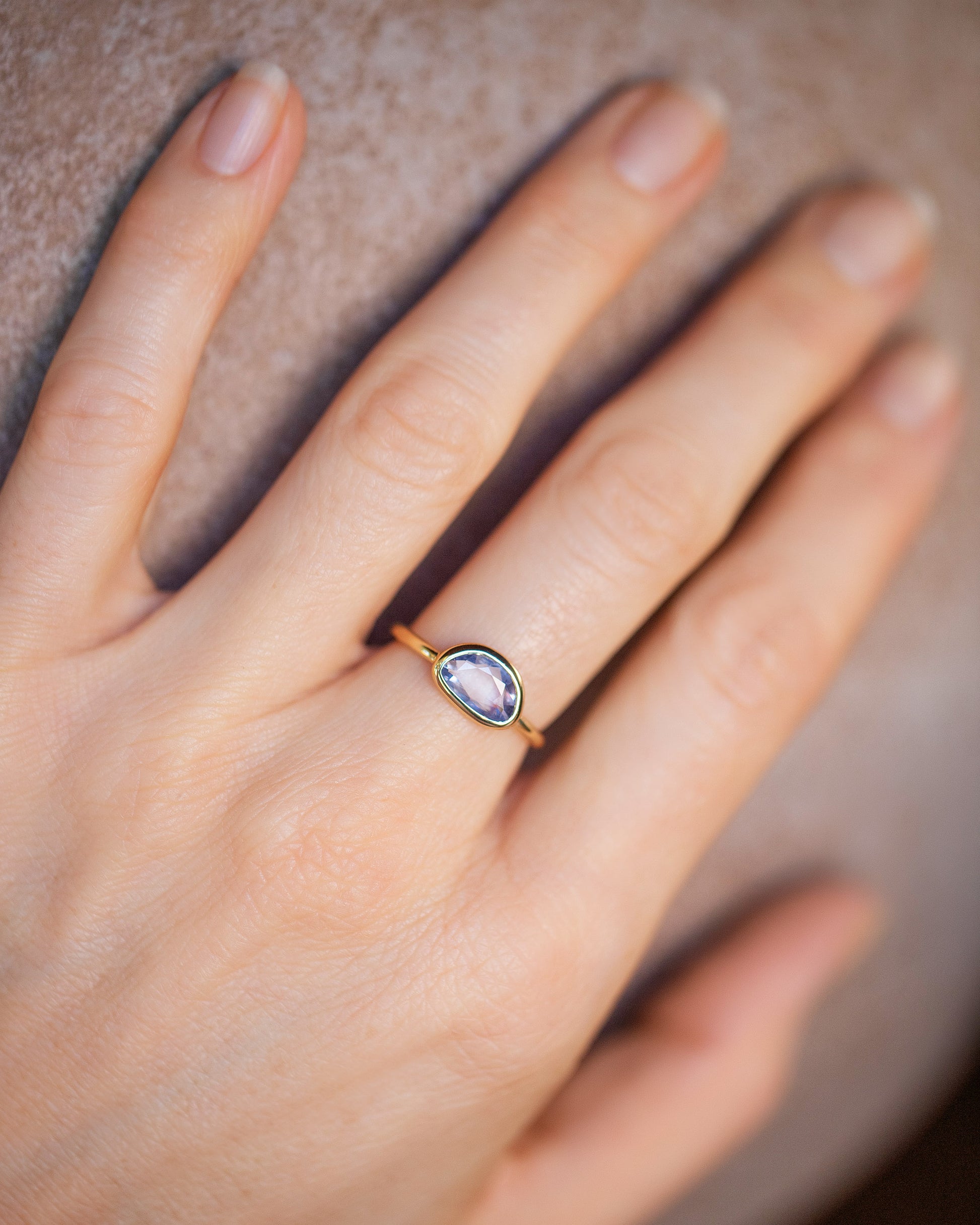 Gusher Blue Sapphire Ring 055 on model.