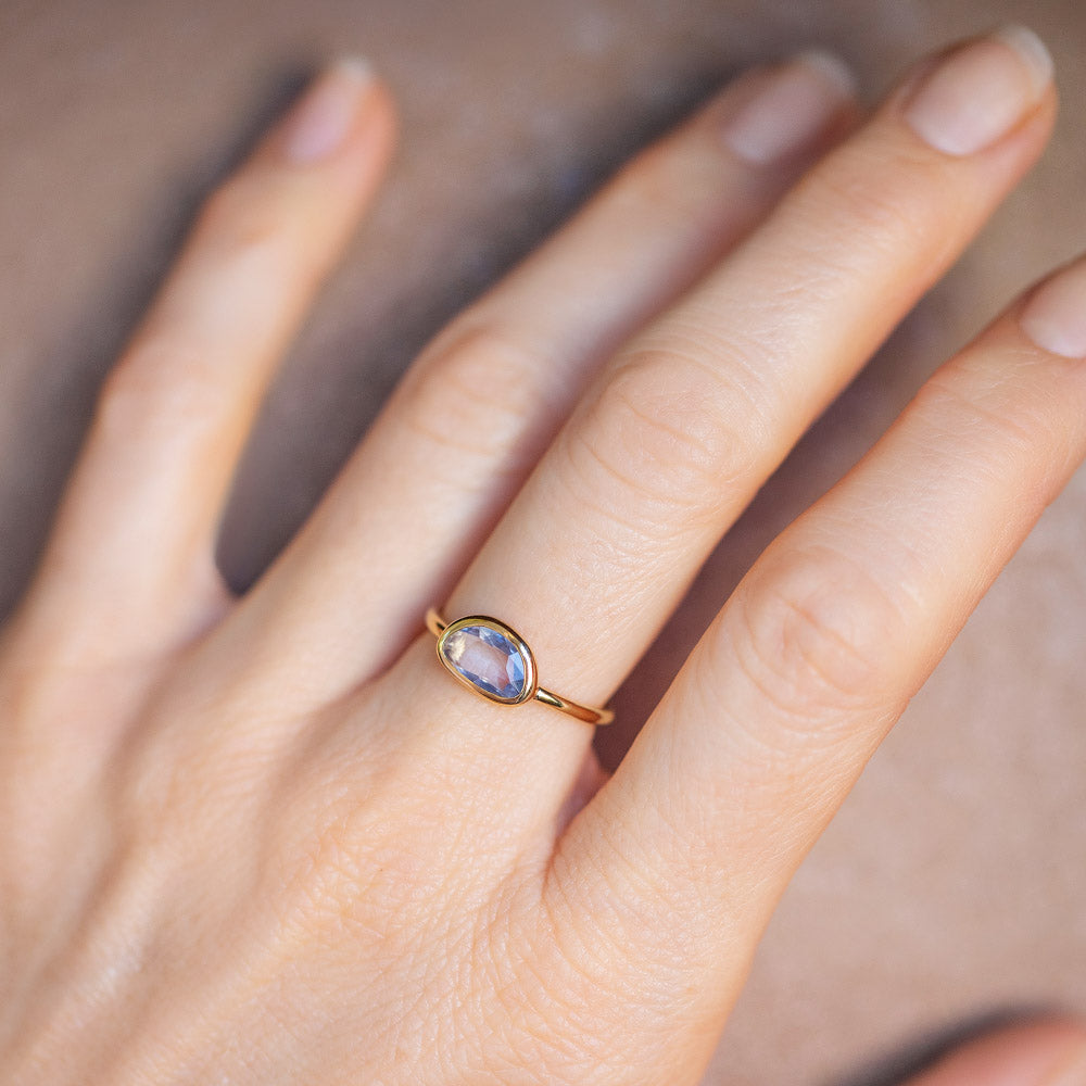 product_details::Gusher Blue Sapphire Ring 055 on model.