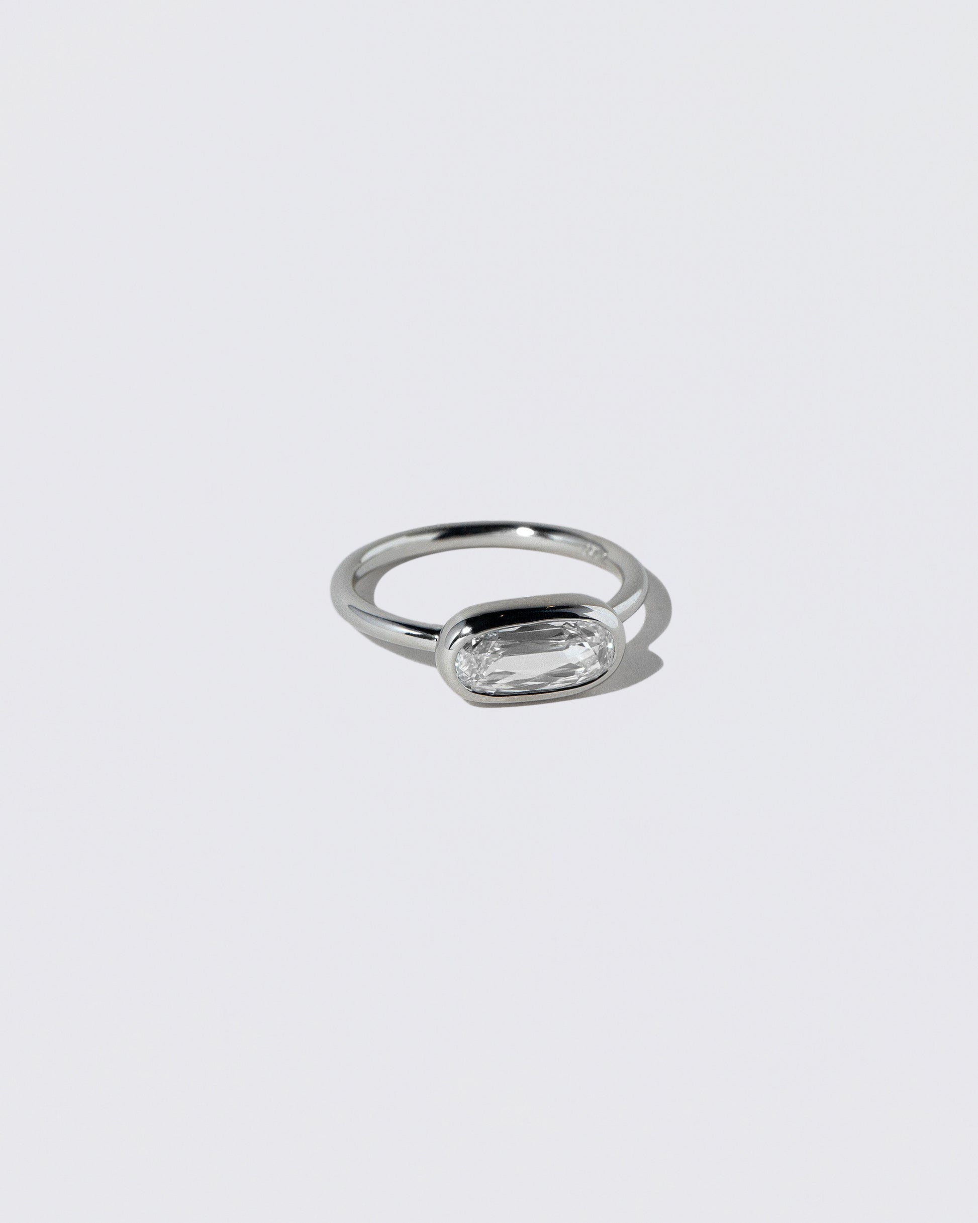 View from the side of the Gusher Diamond Ring 029 on light color background.