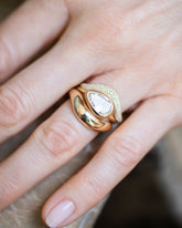 Gusher Diamond Ring 046, Gold Wide Level Band and Gold Pavé Thin Level Band stack on model.