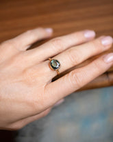 Gusher Green Sapphire Ring 032 on model.