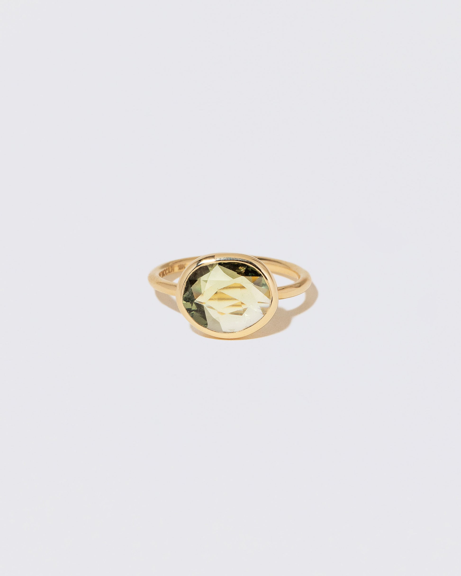 Gusher Green Sapphire Ring 052 on light color background.