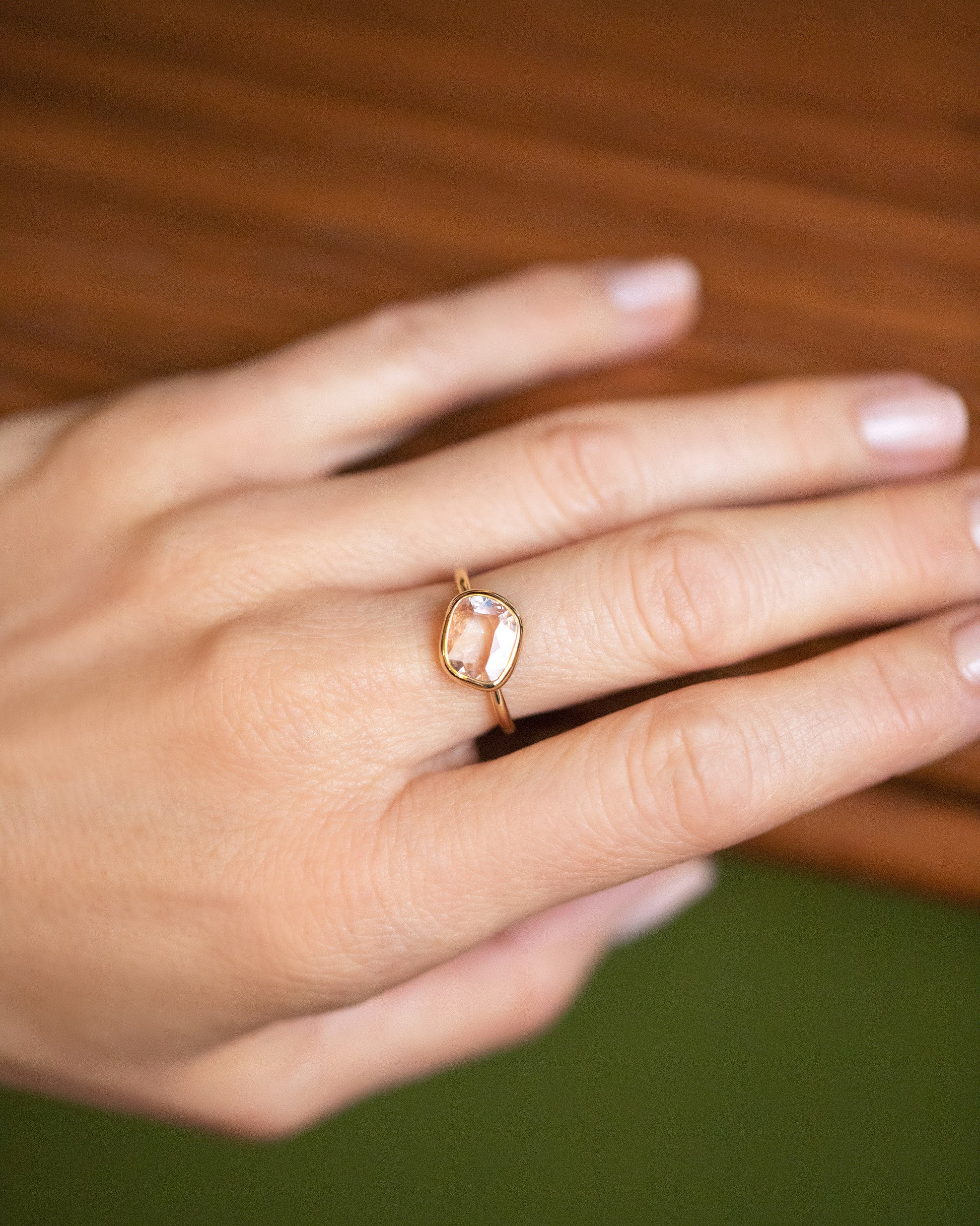Gusher Pink Sapphire Ring 040 on model.