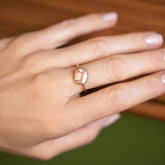 product_details::Gusher Pink Sapphire Ring 040 on model.