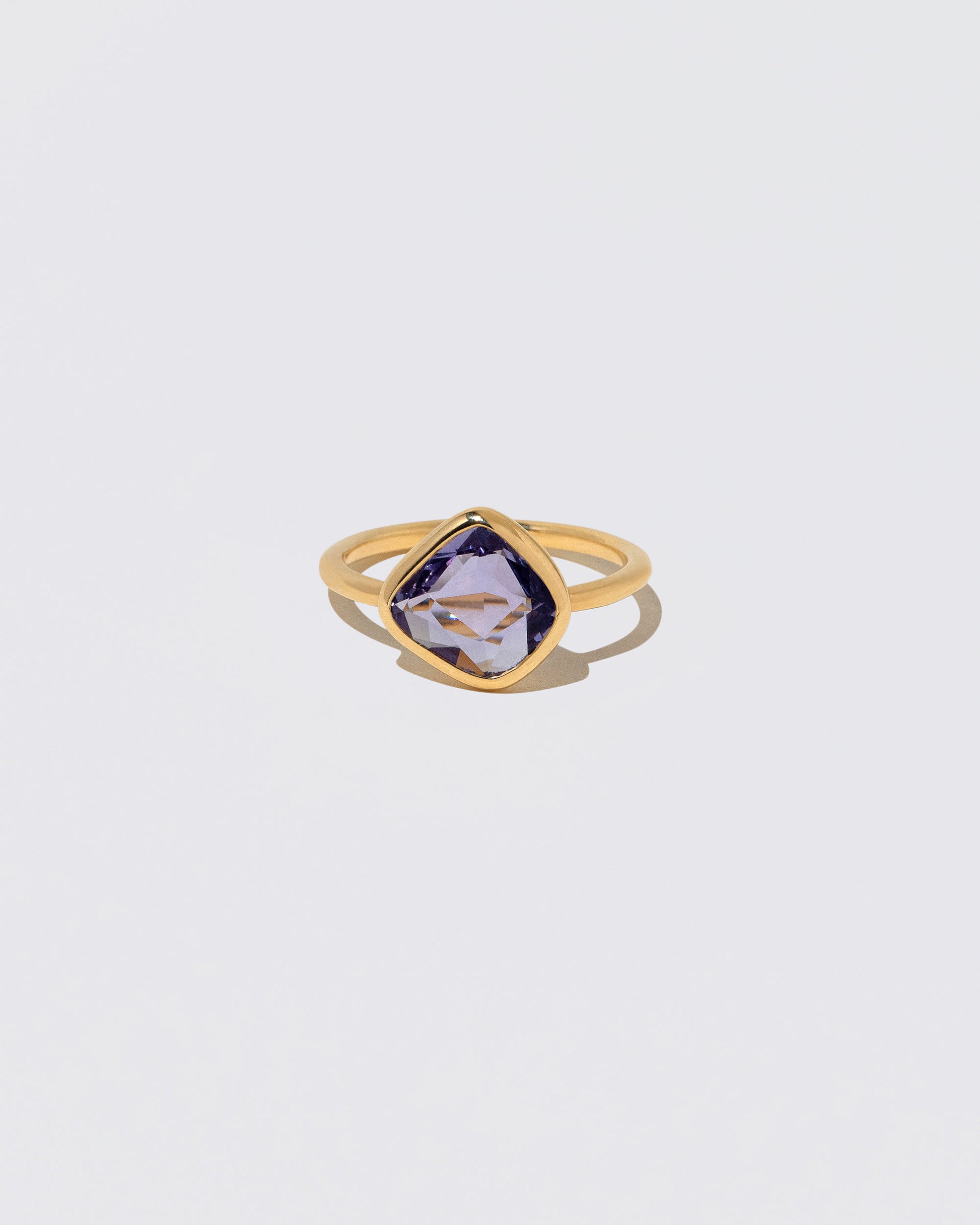 Gusher Purple Sapphire Ring 054 on light color background.