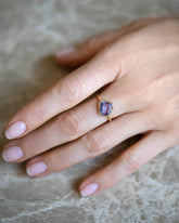 Gusher Purple Sapphire Ring 054 on model.