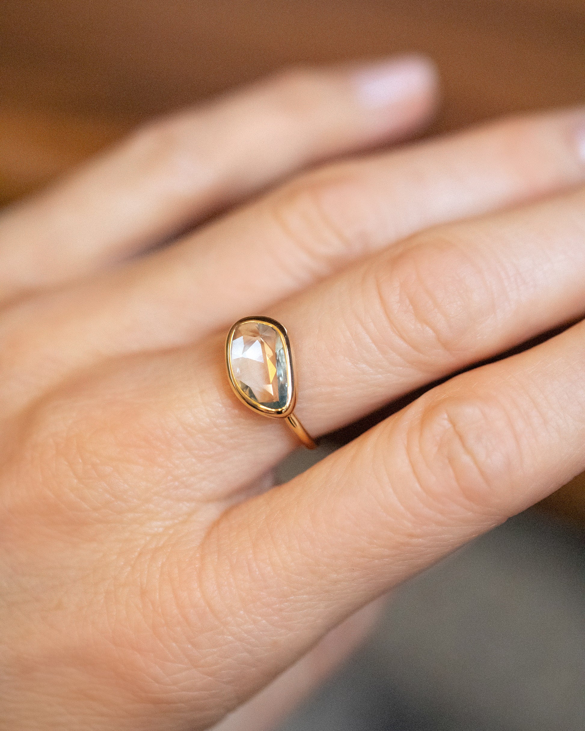 Gusher Teal Sapphire Ring 038 on model.