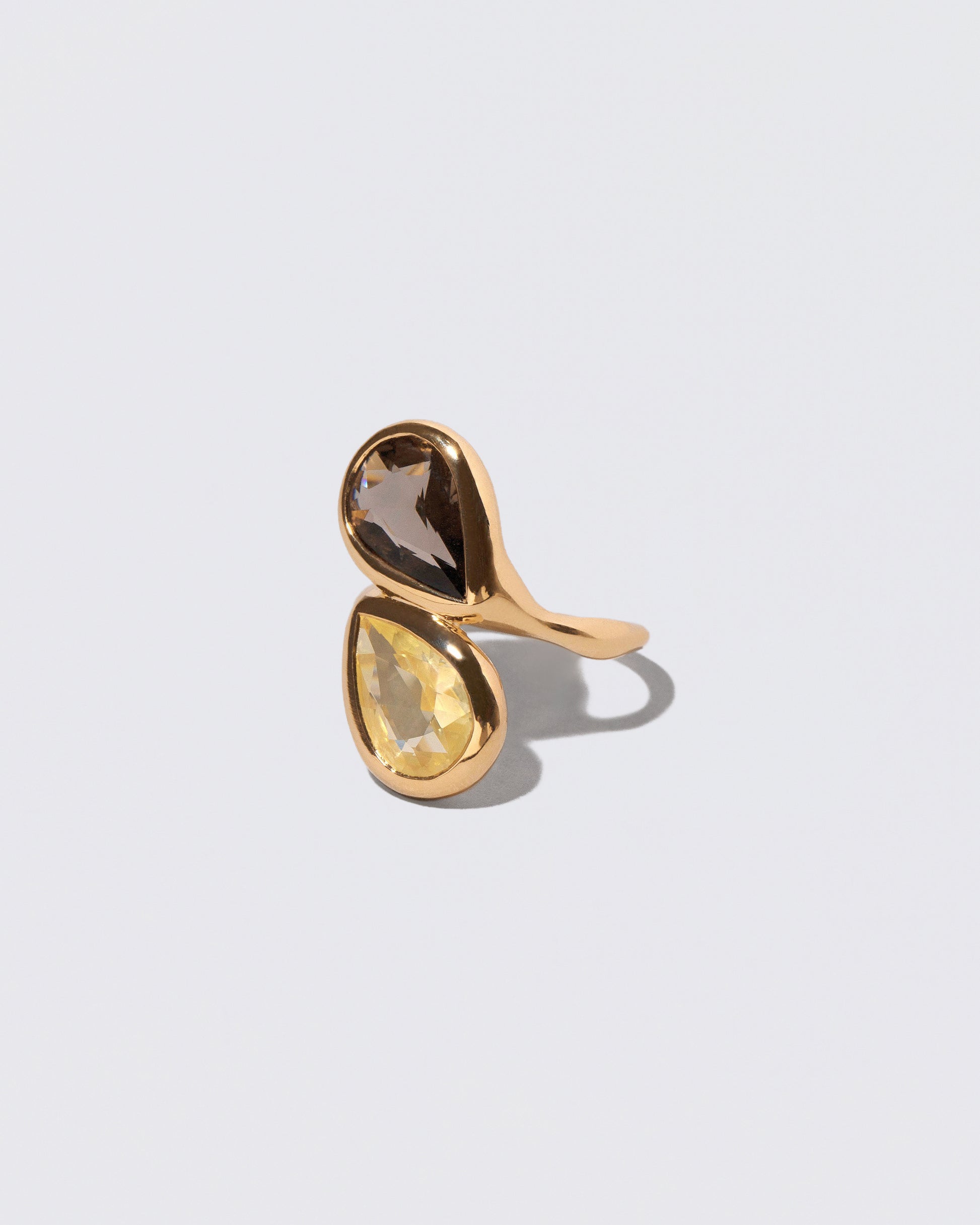 View from the side of the Illusion of Opposites Ring on light color background.