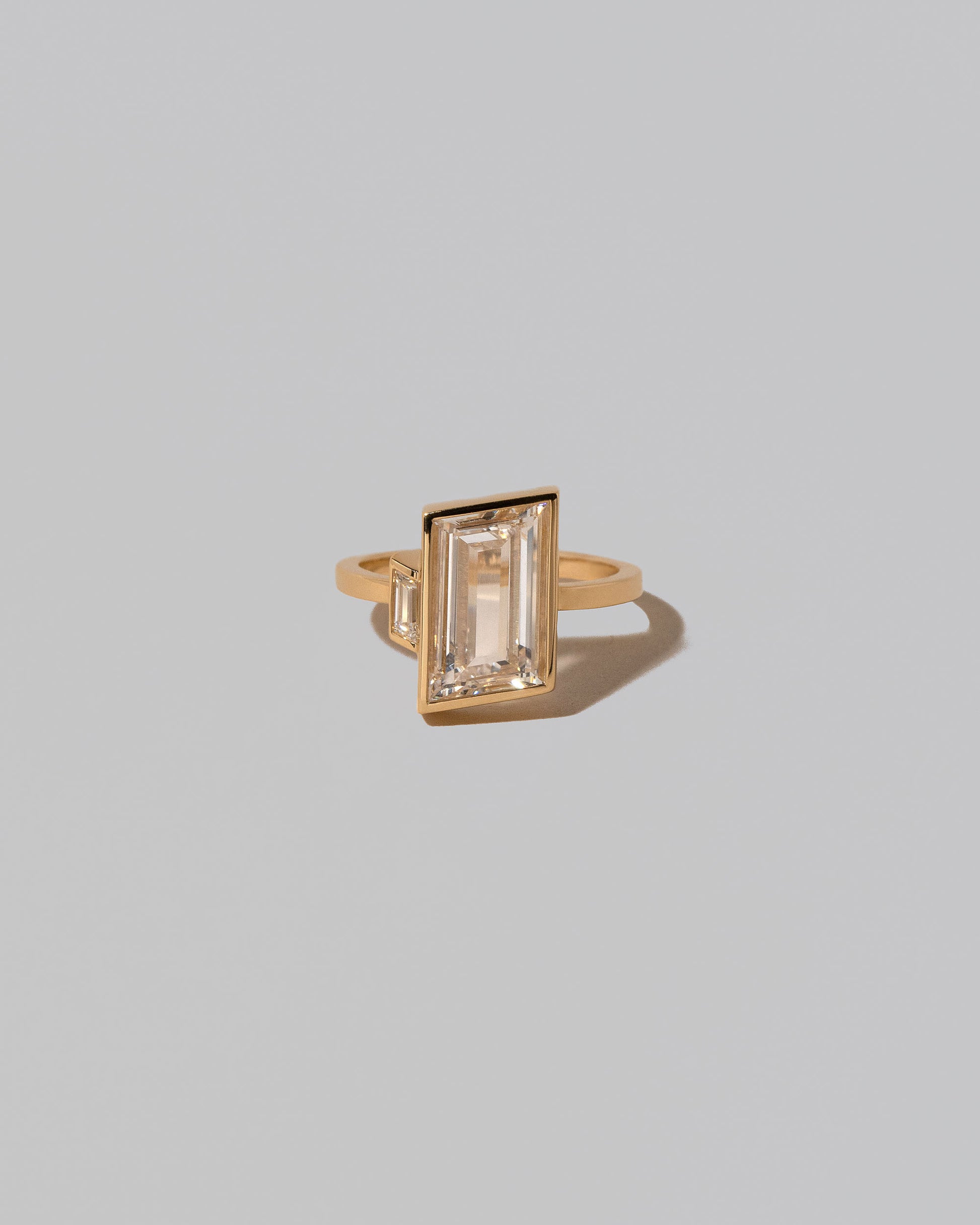 Laelia Ring on light color background.