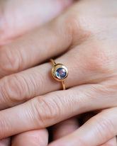 Bicolor Blue Sapphire Level Ring on model.