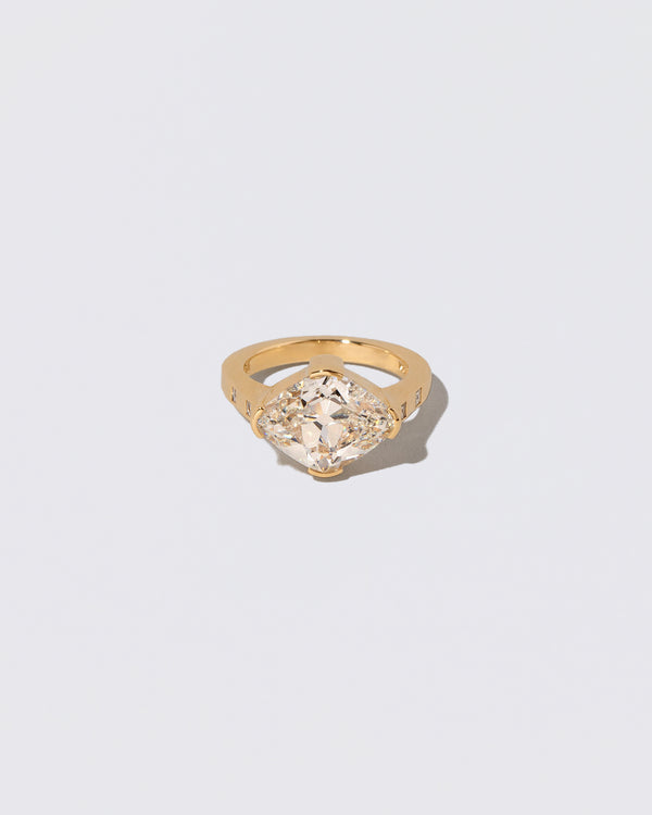 Narcissus Ring on light color background.