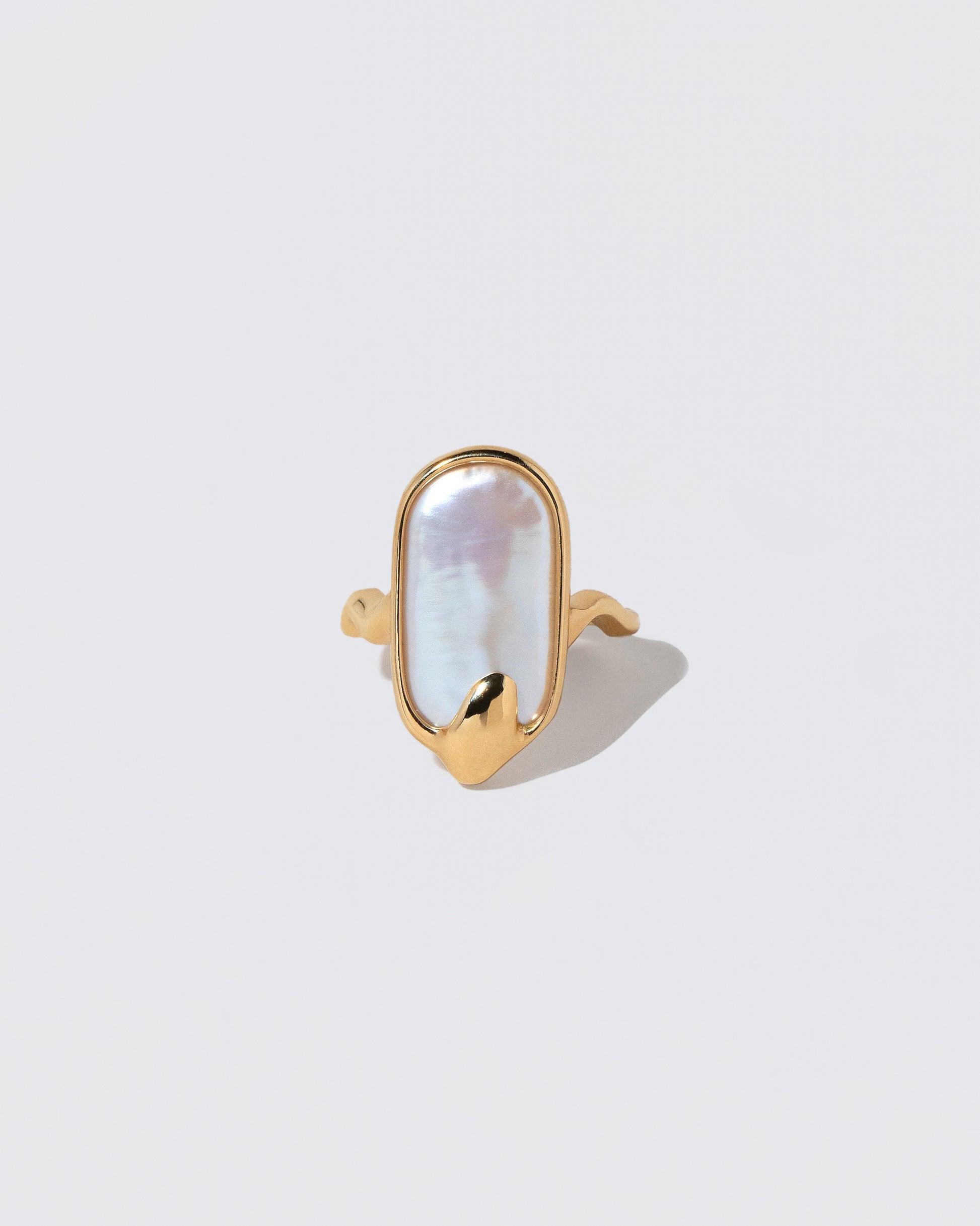 Oceanus Ring on light color background.