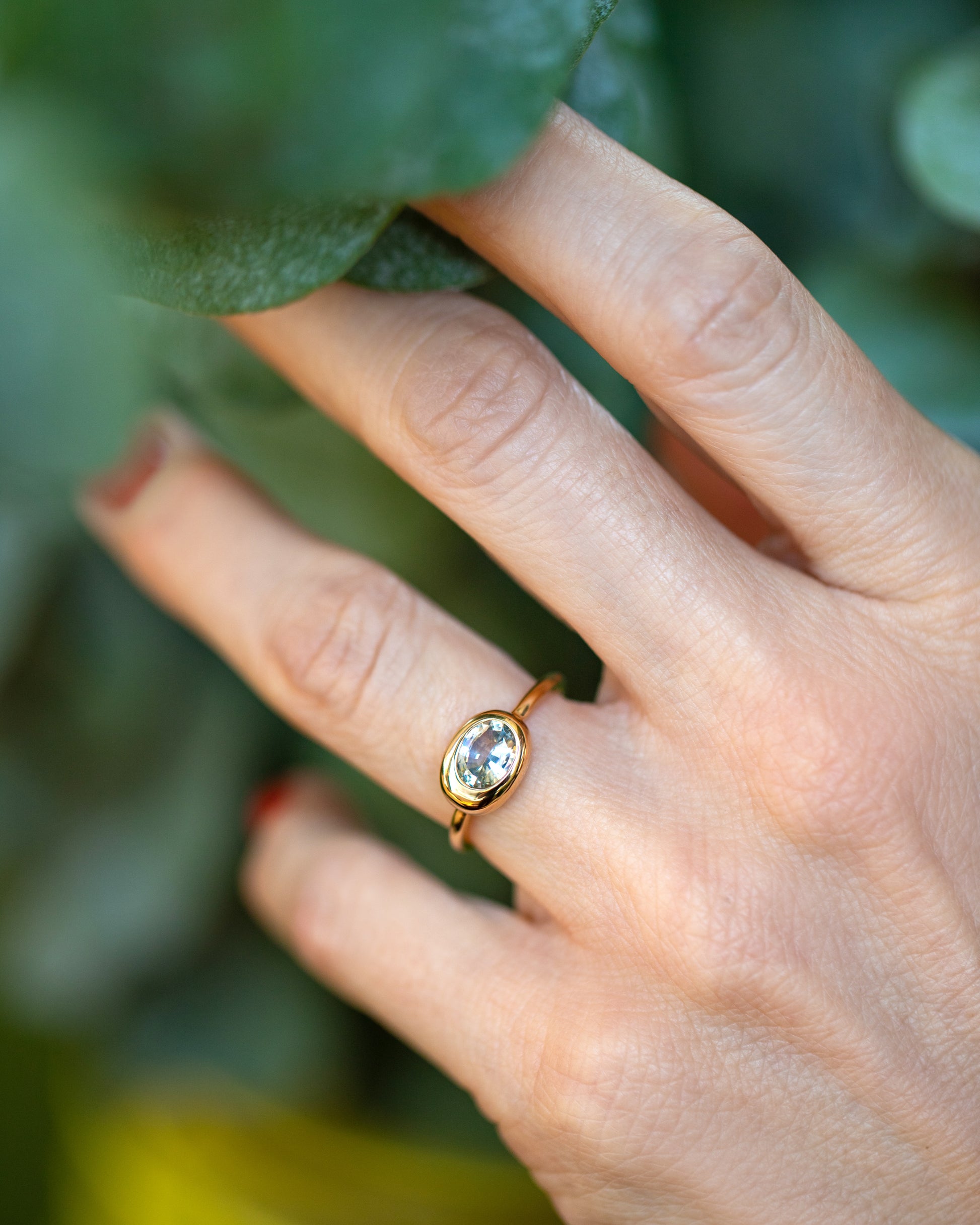 Oval Sapphire Equalize Ring on model.