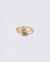 Oval Bicolor Sapphire Precise Ring on light color background.