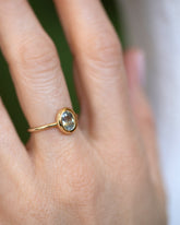 Oval Bicolor Sapphire Precise Ring on model.