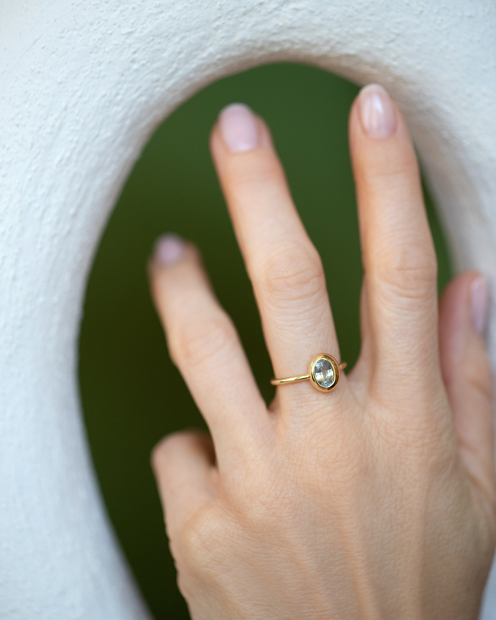 Oval Bicolor Sapphire Precise Ring on model.