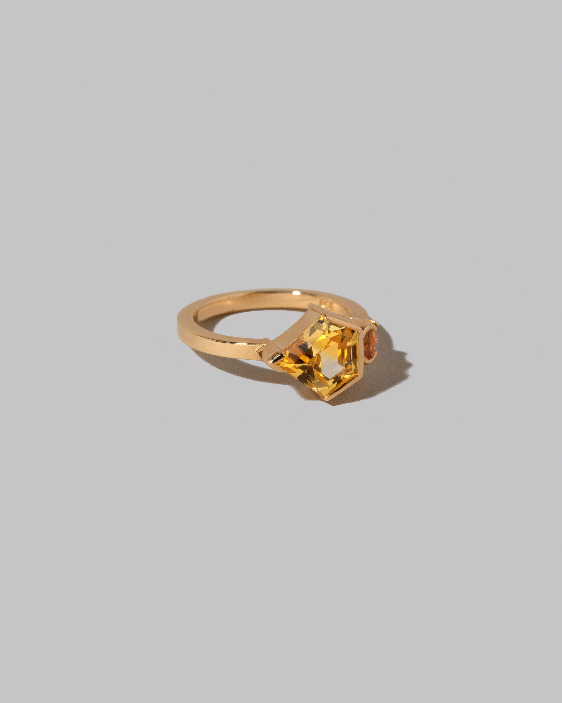 View from the side of the Promenea Ring on light color background.