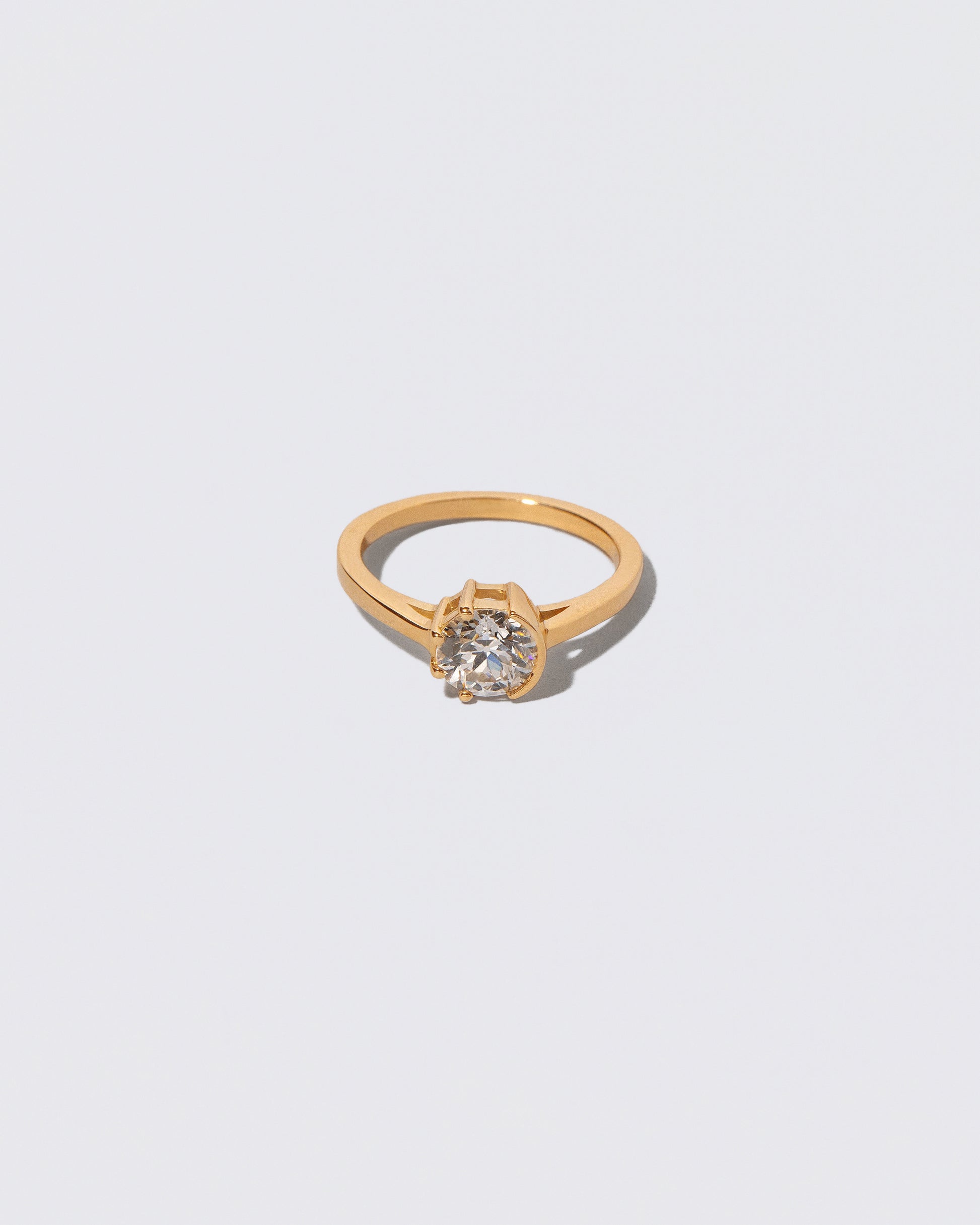 White Diamond Sun & Moon Ring on light color background.