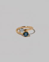 Sapphire & Diamond Sun & Moon Union Ring on light color background.