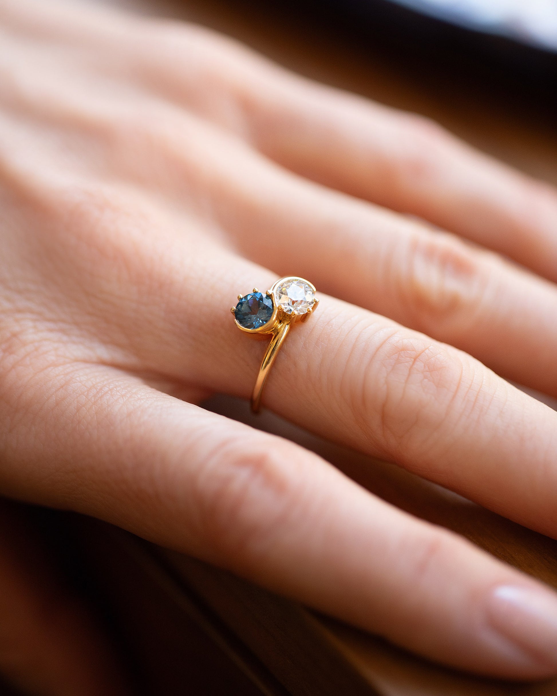 Sapphire & Diamond Sun & Moon Union Ring on model.