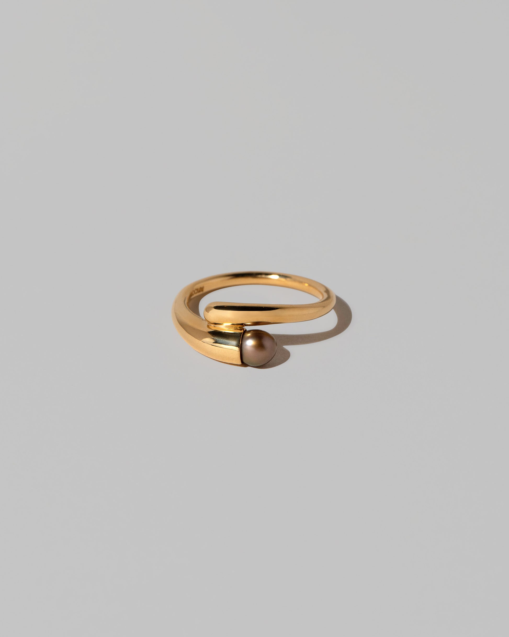 Tethys Ring on light color background.