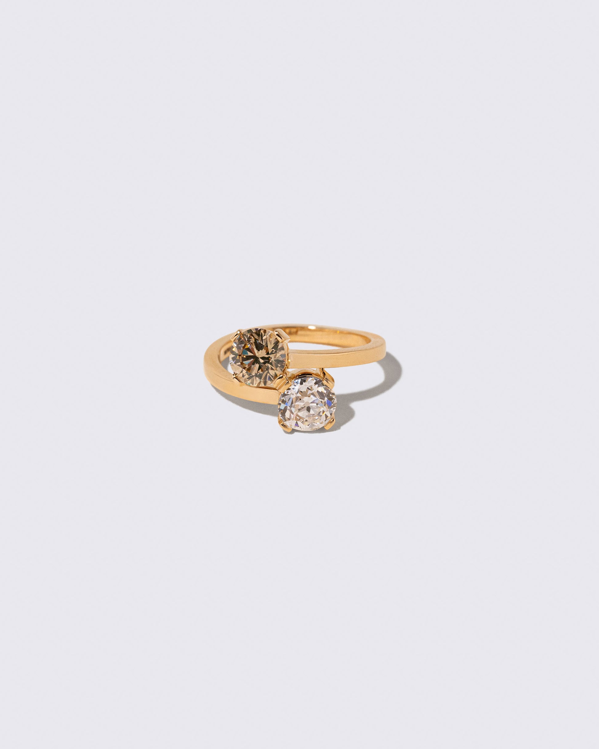 Champagne & White Diamond Union Ring on light color background.