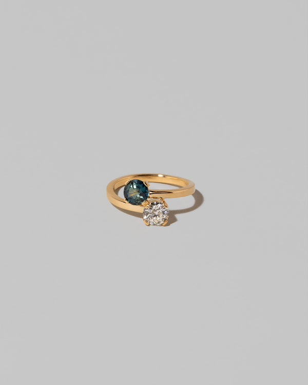 Sapphire & Diamond Union Ring on light color background.