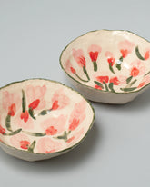 Group of Samantha Kerdine x La Romaine Editions Tulip Dishes on light color background.