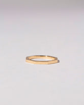 Gold Solid 1.7mm Segmented Half Hoop Band on light color background.