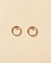 Spinel Rose Gold Coil Stud Earrings on yellow color background.