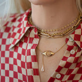 product_details::Segmented Chain Necklace, Short Loop Chain Necklace, Link Necklace and Diamond State Shifter Necklace on model.