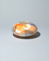 Stories of Italy Nougat Boule Vase on light color background.