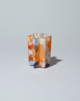 Stories of Italy Extra Small Orange Nougat Bucket Vase on light color background.