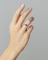 Bicolor Teal Sapphire Sun & Moon Ring on model.