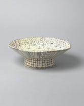Suzanne Sullivan One Footed Bowl on light color background.